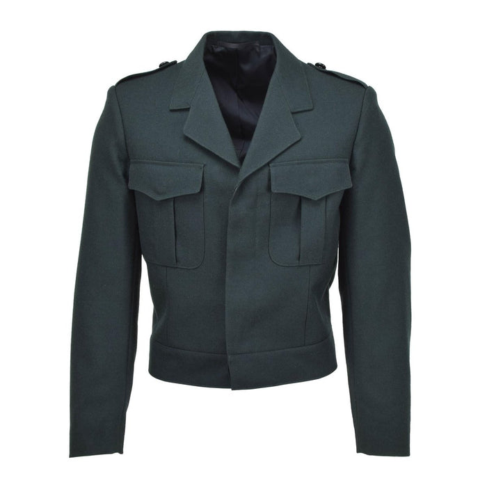 Oryginalna wełniana bluza w kolorze belgijskiej armii, z kieszeniami zapinanymi na guziki i wysokim stanem, w stylu militarnym.