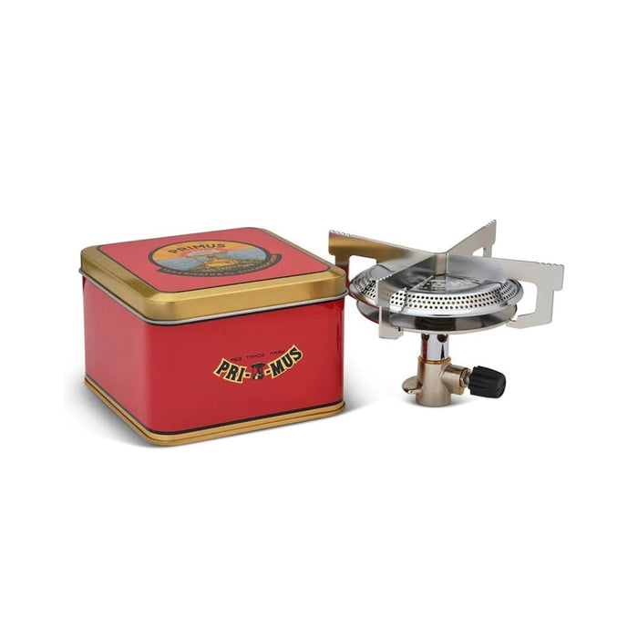 Palnik kempingowy Primus ClassicTrail Stove 130 z szerokim płomieniem, solidną konstrukcją z czterema kapsułami i kompaktową czerwoną metalową puszką do przechowywania.